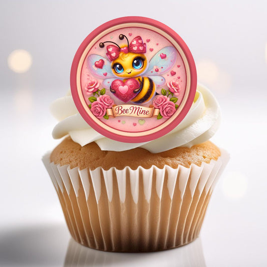 Cupcake with a bee-themed topper labeled 'Bee Mine' on a light background