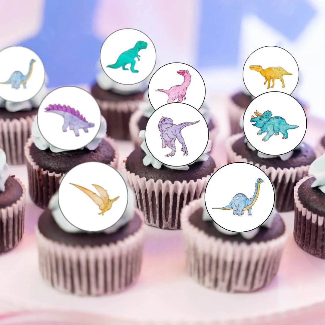 colourful dinosaur illustrated cake toppers on chocolate cupcakes with white frosting