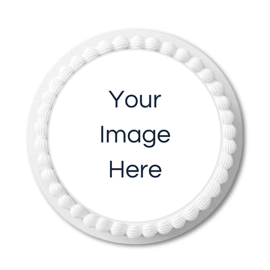 Custom wafer cake topper on white frosted cake
