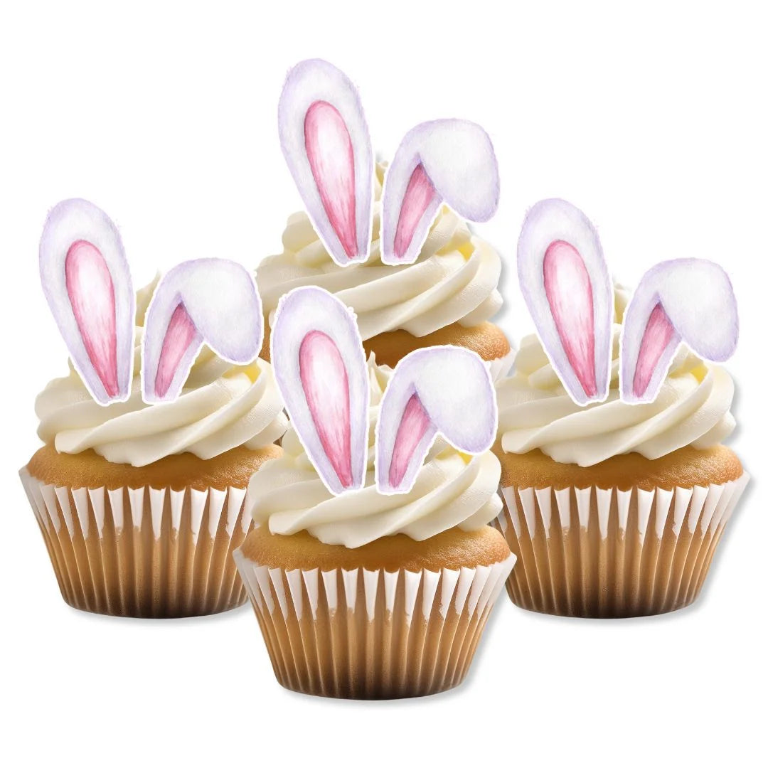 Edible wafer Easter bunny ears on white frosted cupcakes