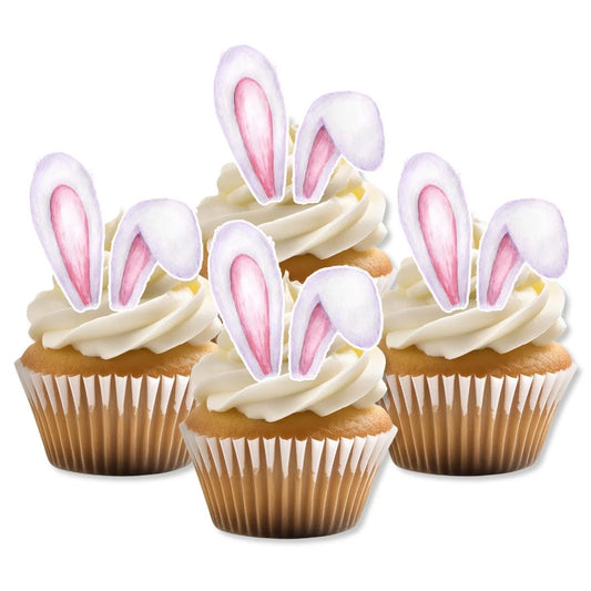 Edible wafer Easter bunny ears on white frosted cupcakes