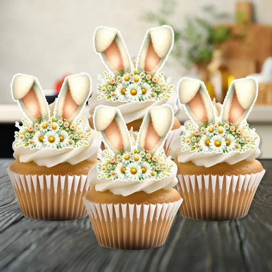 Edible bunny ears cupcake toppers with daisies, on top of white frosted cupcakes
