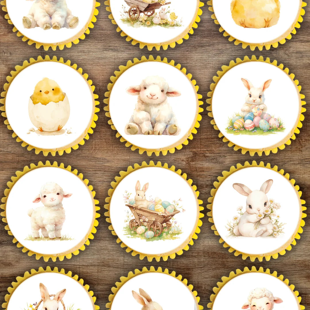 Cute spring animal edible cupcake toppers, placed on frosted cupcakes with yellow cases