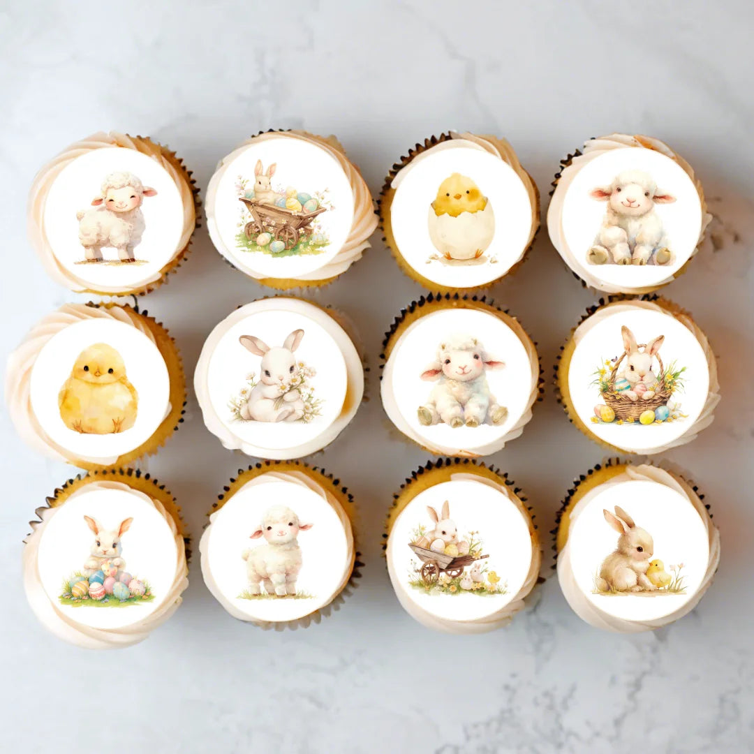 Cute spring animal edible cupcake toppers, placed on frosted cupcakes