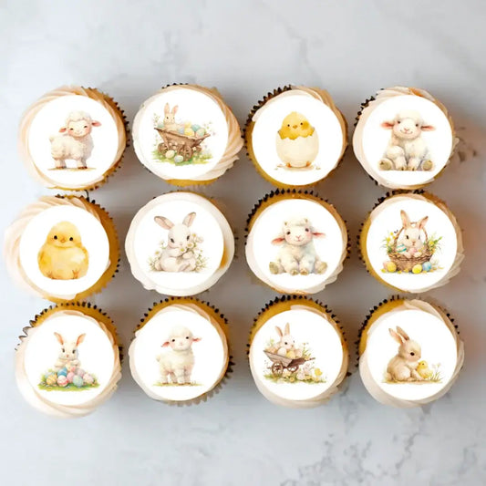 Cute spring animal edible cupcake toppers, placed on frosted cupcakes