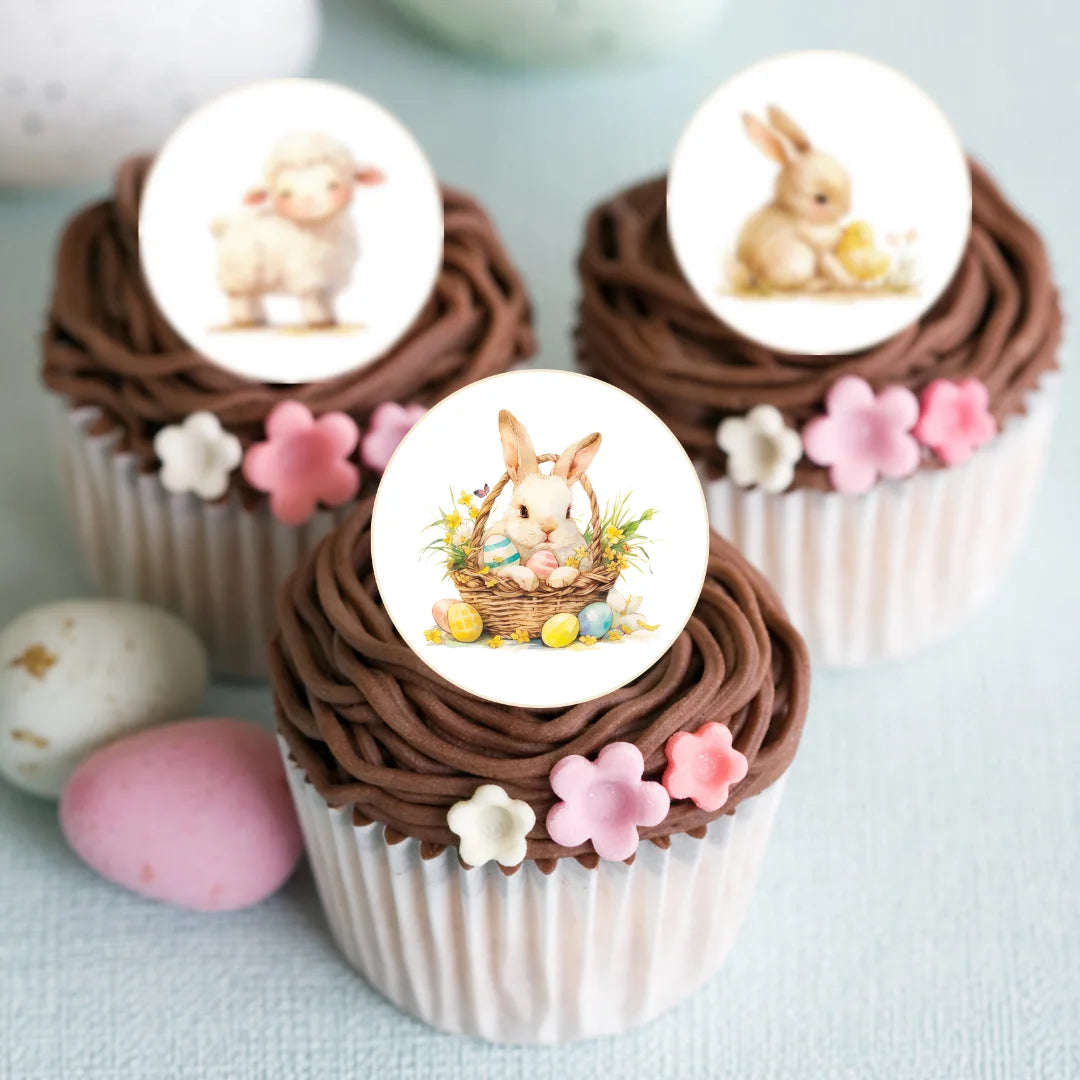 Cute spring animal edible cupcake toppers, placed on chocolate frosted cupcakes