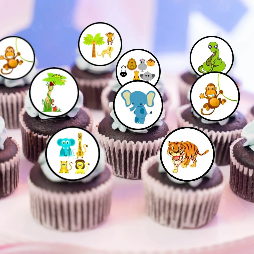jungle themed edible cupcake toppers on chocolate cupcakes with with white frosting