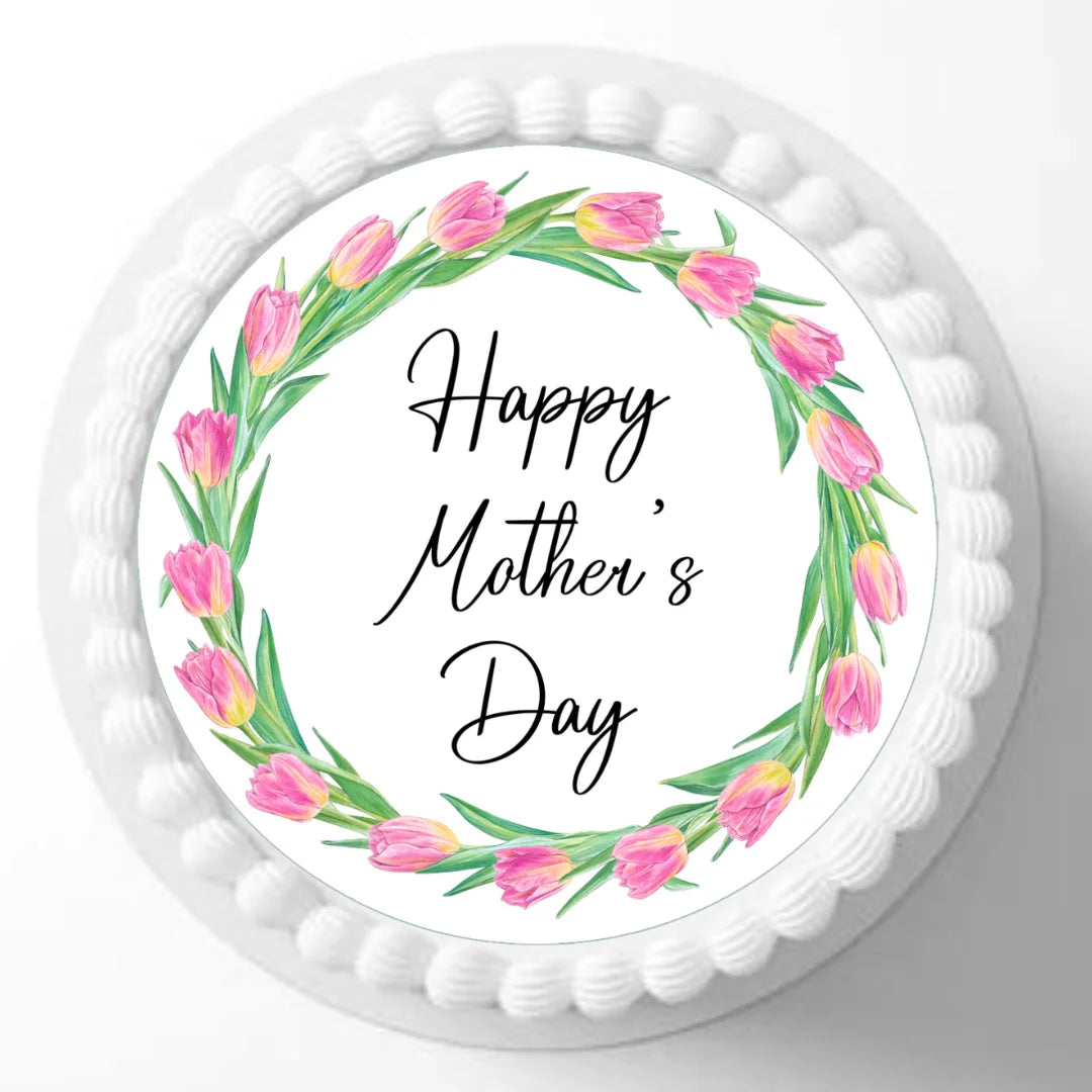 Spring tulip mothers day edible cake topper placed on a white iced cake