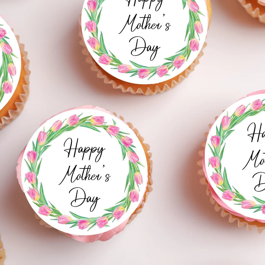 Spring tulip mothers day edible cupcake toppers, placed on pink frosted cupcakes