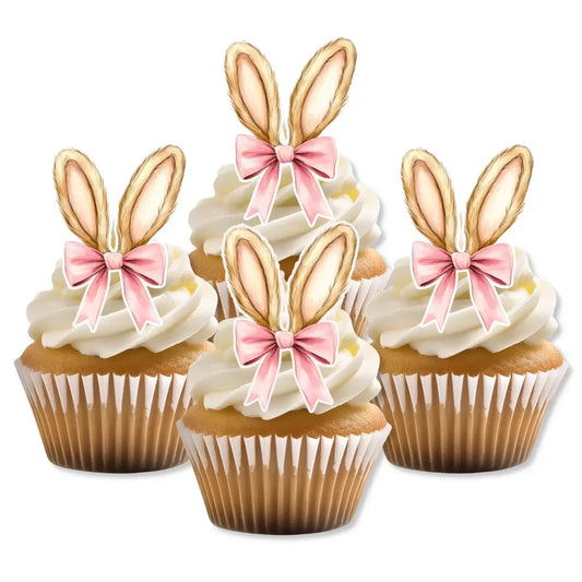 Pink bow wafer bunny ears, placed on white frosted cupcakes