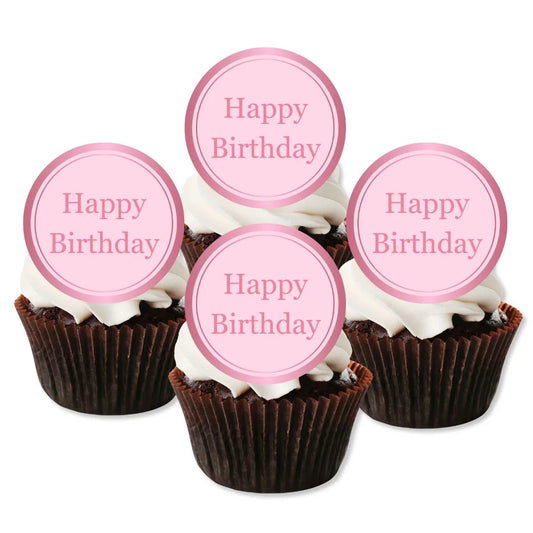 Pink happy birthday cupcake toppers placed on chocolate cupcakes