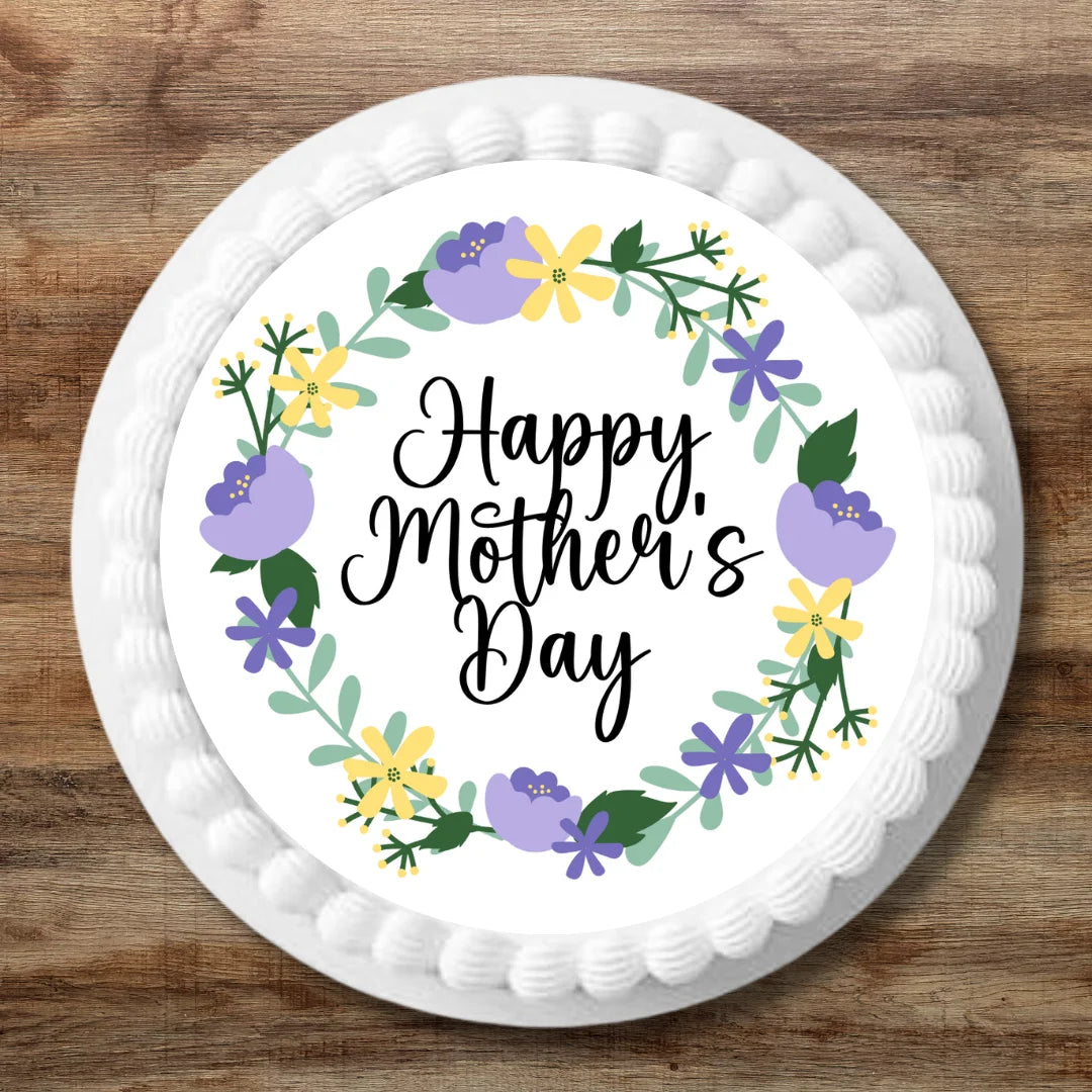 Purple floral mother's day edible topper placed on white iced cake