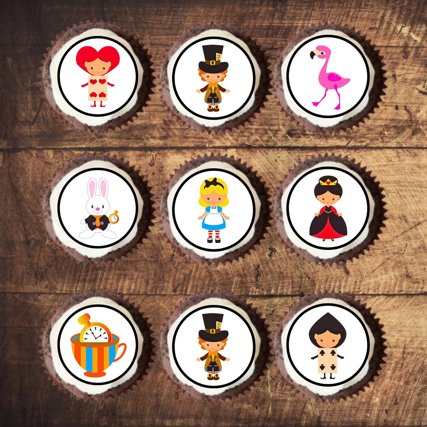 Alice In Wonderland Theme Edible Cupcake Toppers on chocolate cupcakes with white frosting