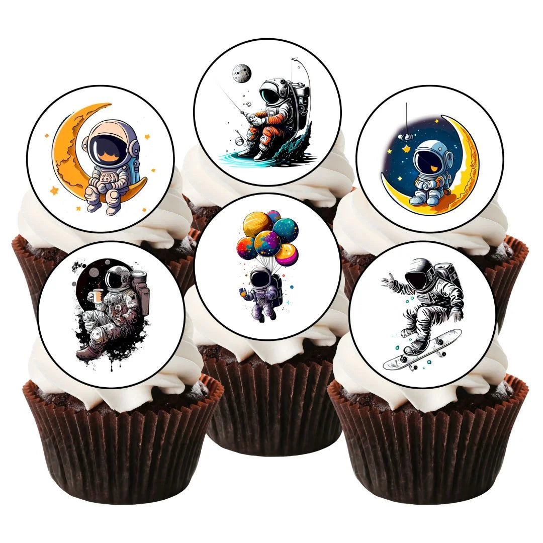 Astronaut Edible Cupcake Toppers on chocolate cupcakes with white frosting