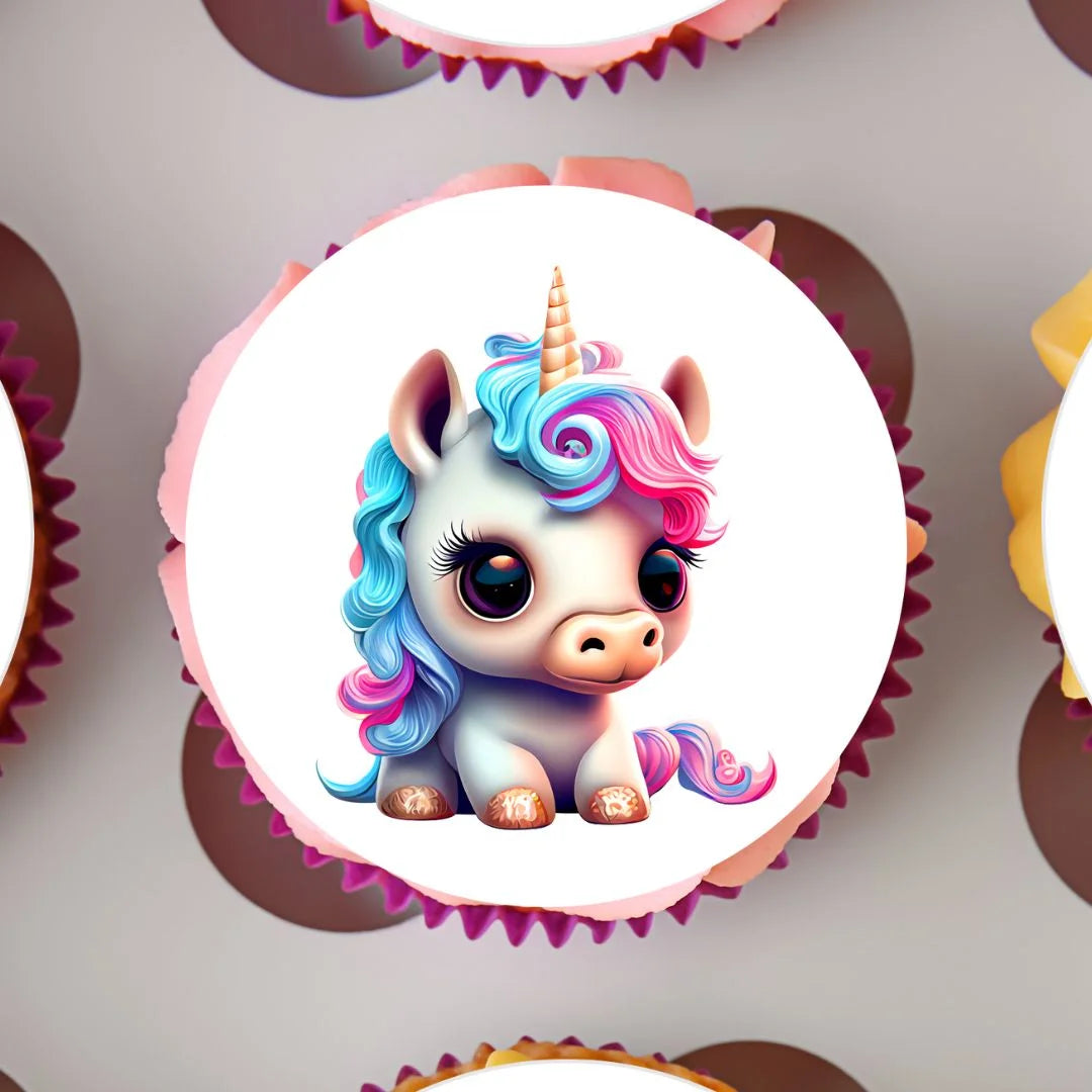 Baby Unicorn Edible Cupcake Toppers on white frosted cupcakes