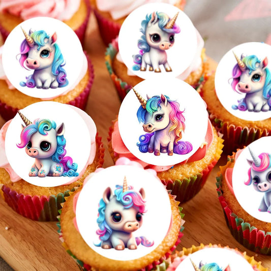 Baby Unicorn Edible Cupcake Toppers on white frosted cupcakes