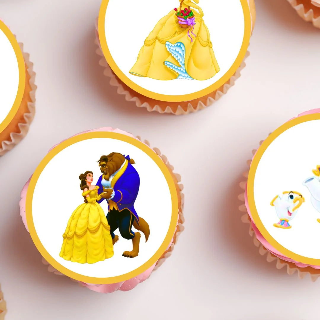 Beauty & The Beast Edible Cupcake Toppers on chocolate cupcakes with white frosting