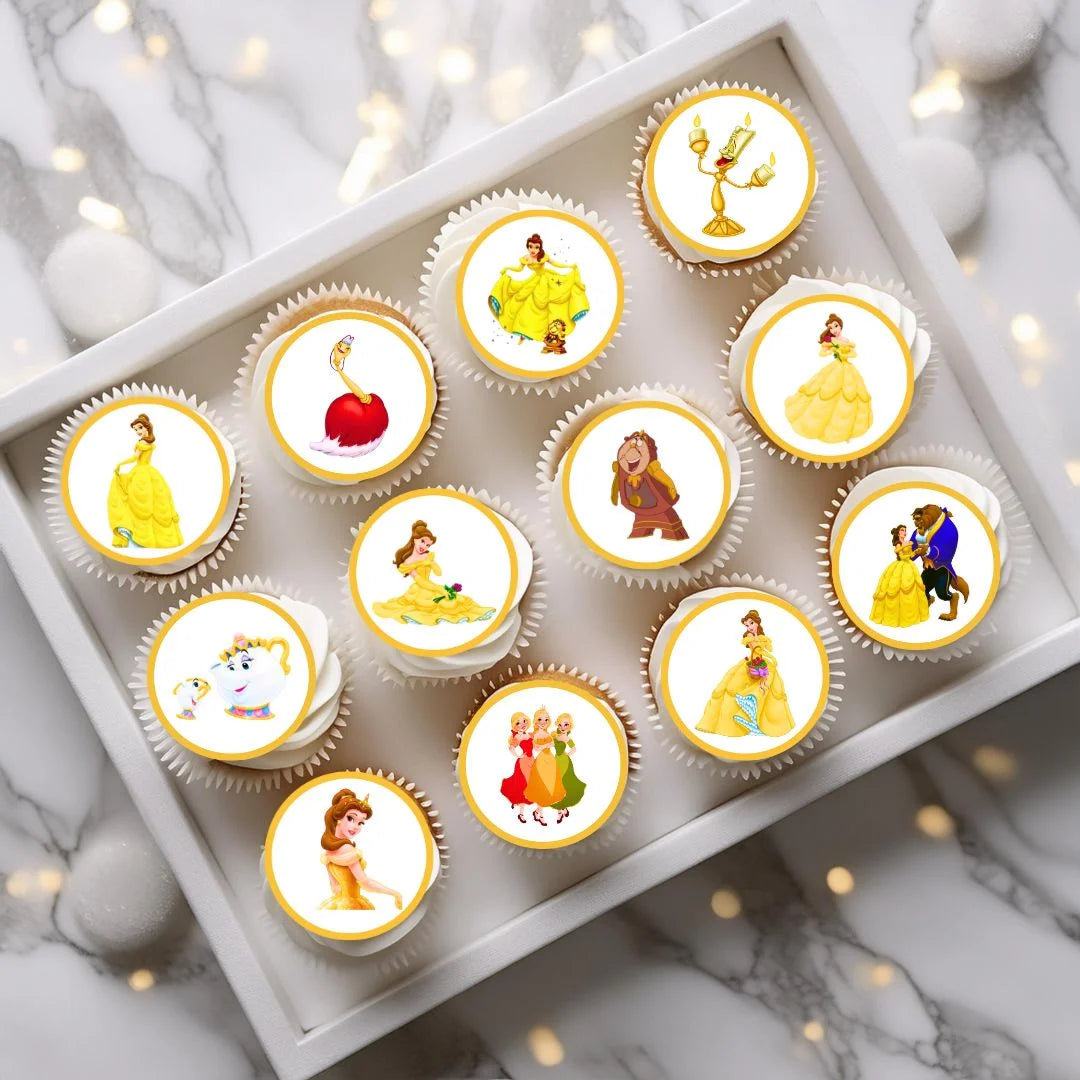Beauty & The Beast Edible Cupcake Toppers on chocolate cupcakes with white frosting