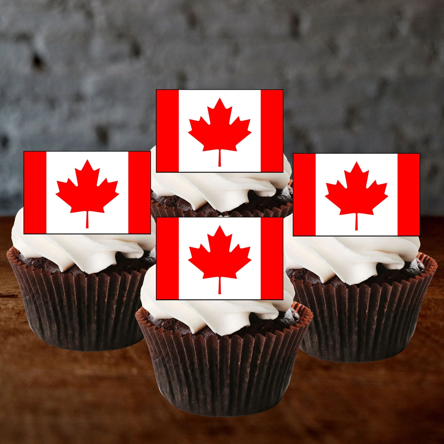 Canadian Flag Edible Cupcake Toppers on chocolate cupcakes with white frosting