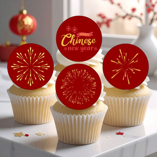 Cupcakes with Chinese New Year-themed toppers on a decorative surface.
