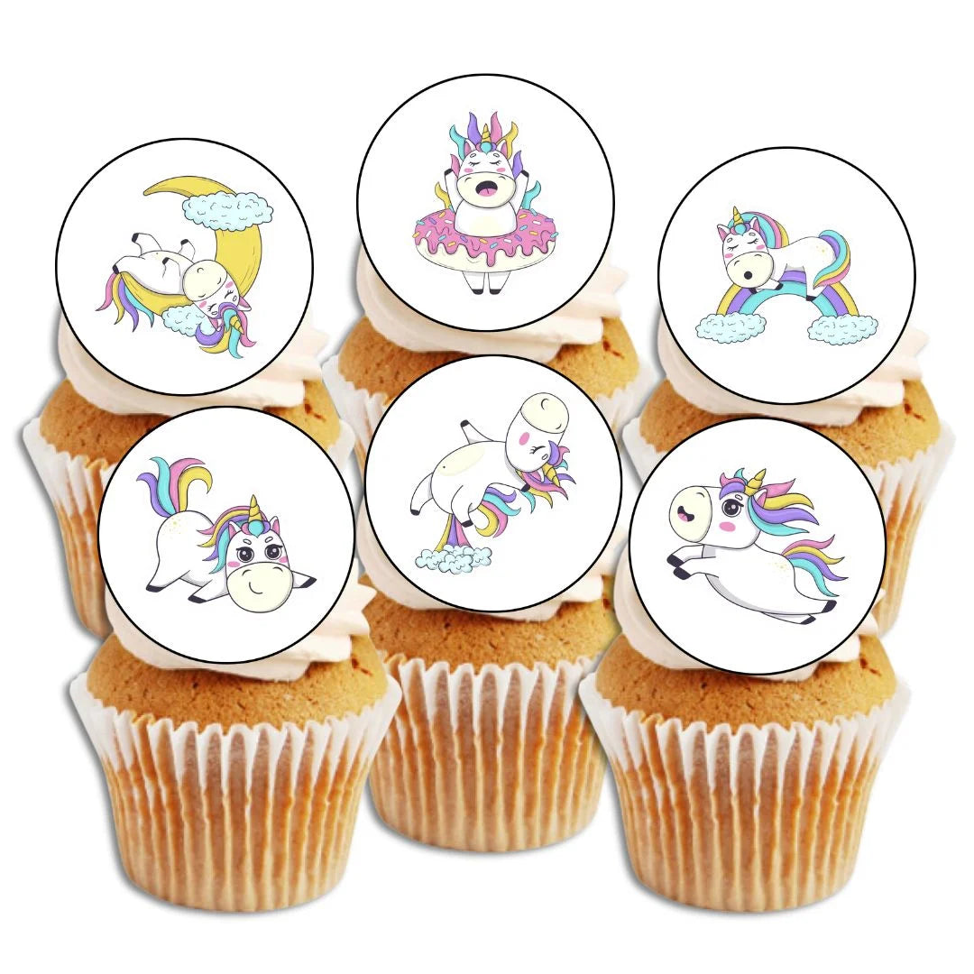 cute unicorn illustrated cupcake toppers on white frosted cupcakes