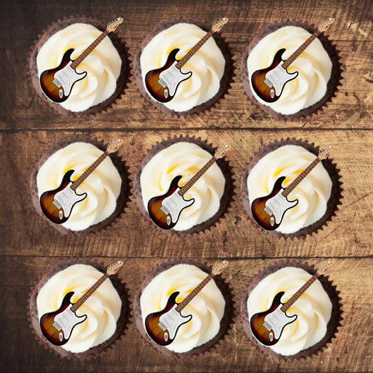 Electric Guitar Edible Cupcake Toppers on chocolate cupcakes with white frosting