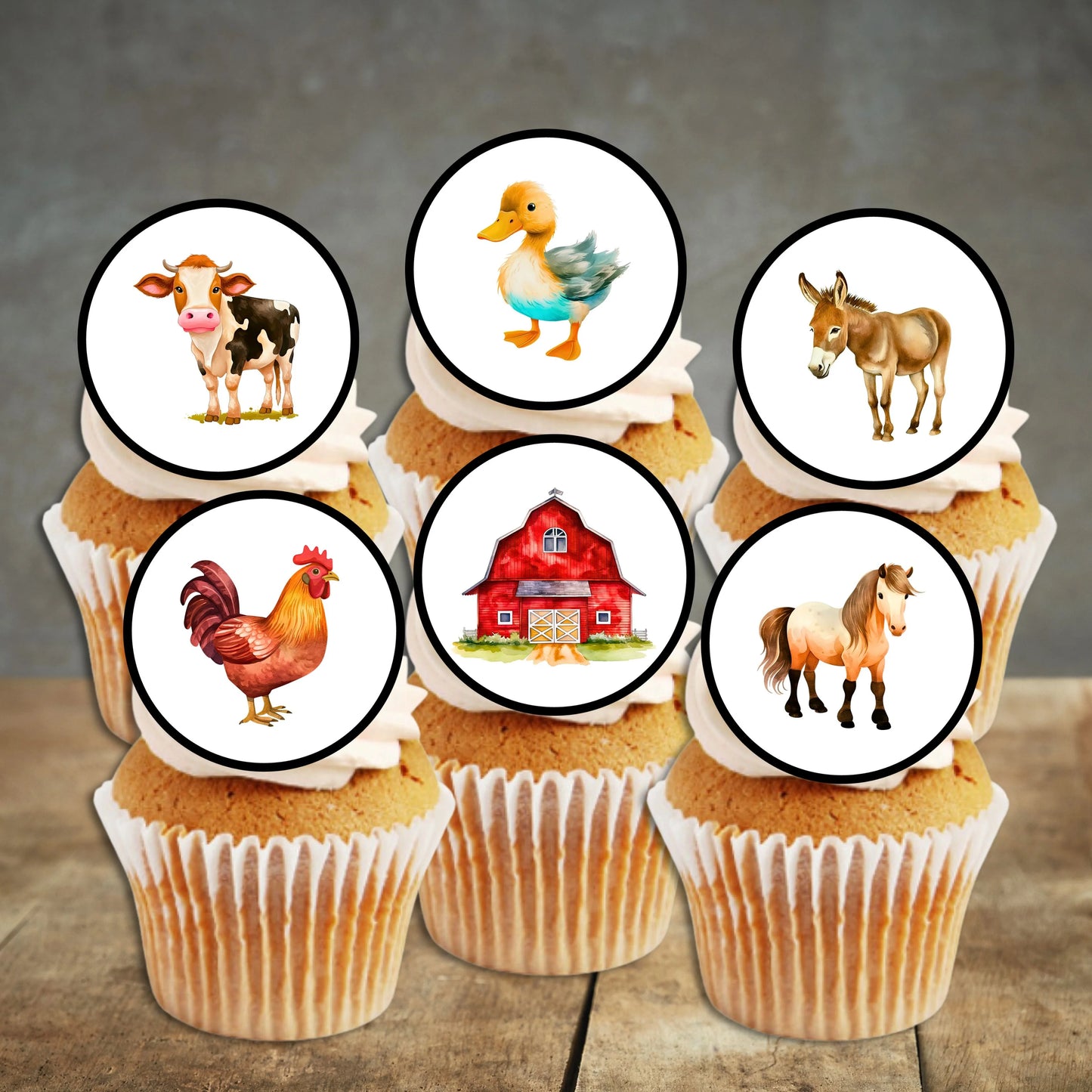 cupcakes with white frosting and circular farm animals cake toppers