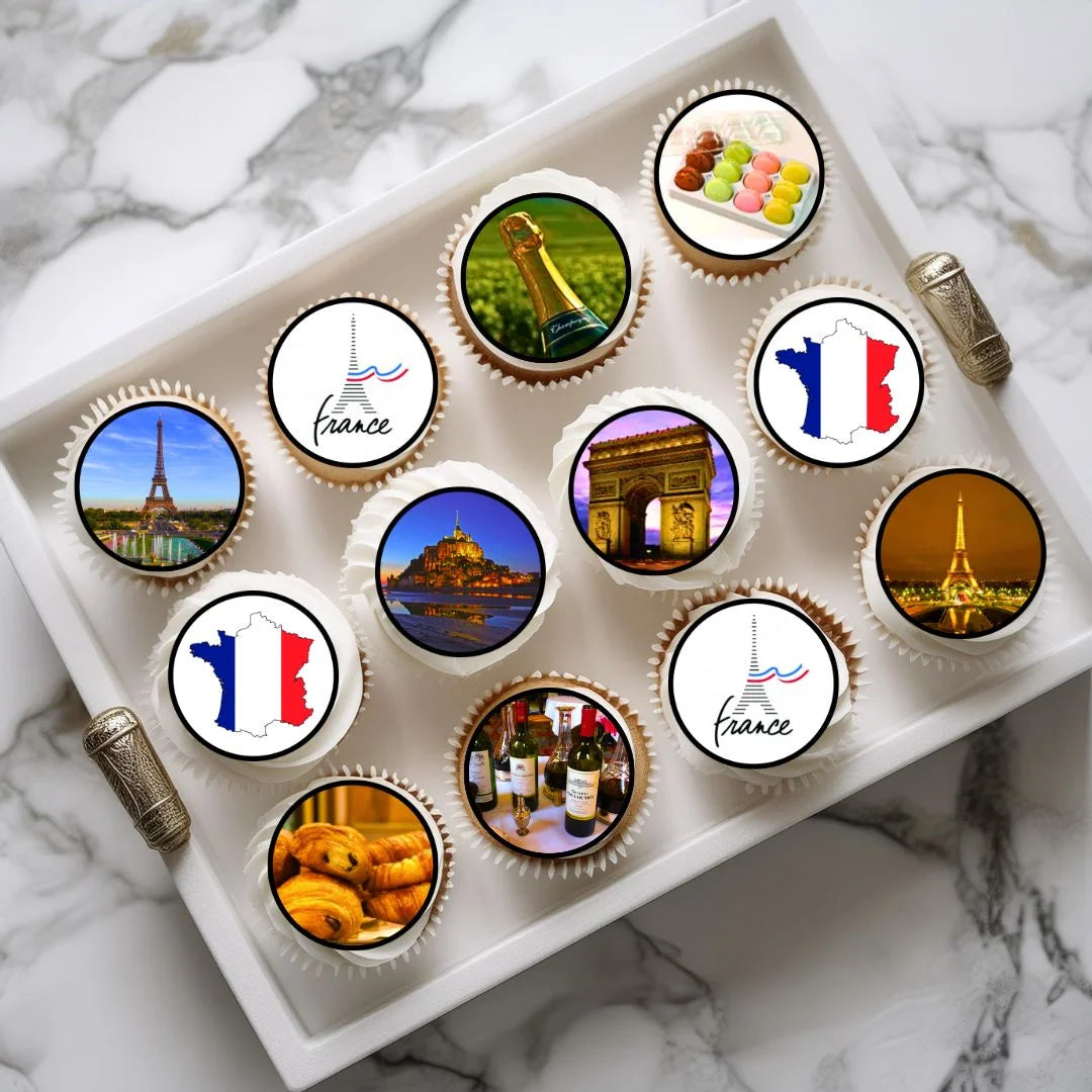 France Themed Edible Cupcake Toppers on chocolate cupcakes with white frosting