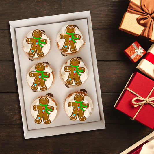 Gingerbread Man Edible Cupcake Toppers on chocolate cupcakes with white frosting