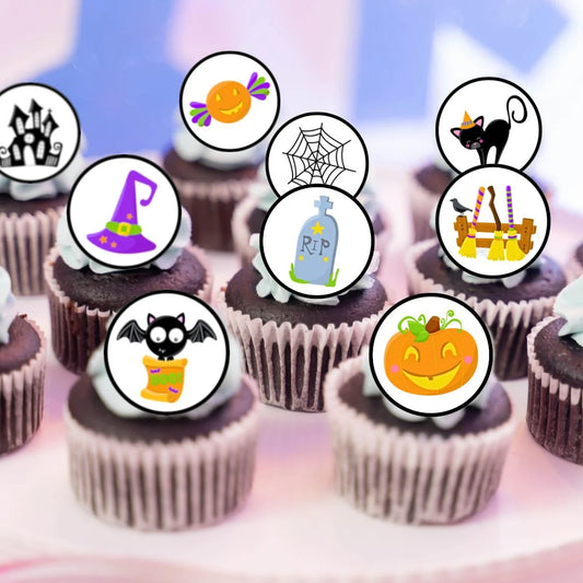 Halloween Theme Edible Cupcake Toppers on chocolate cupcakes with white frosting