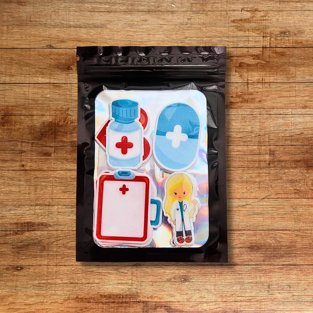 Hospital Theme Shaped Edible Cupcake Toppers in black packaging