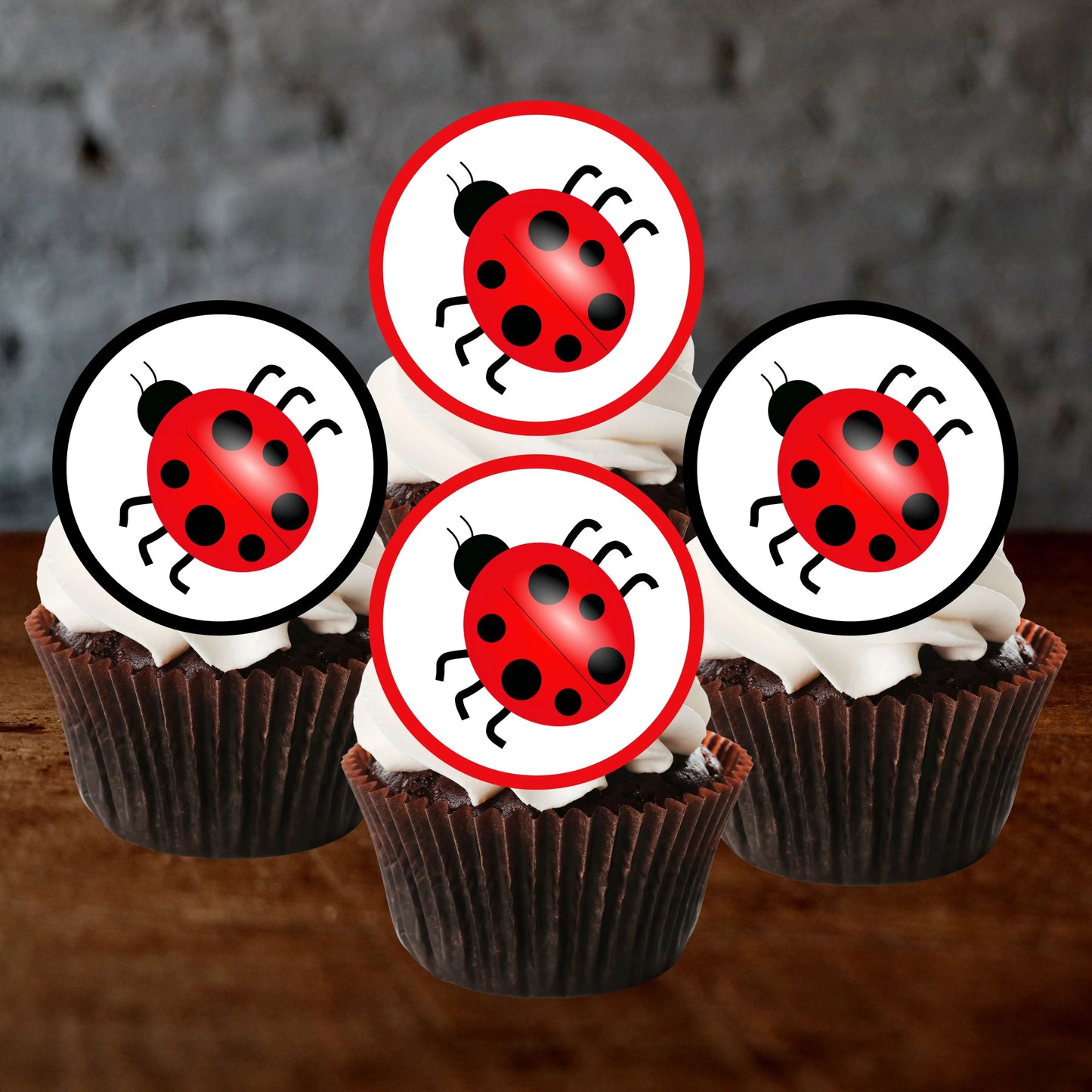 Ladybird Themed Edible Cupcake Toppers on chocolate cupcakes with white frosting