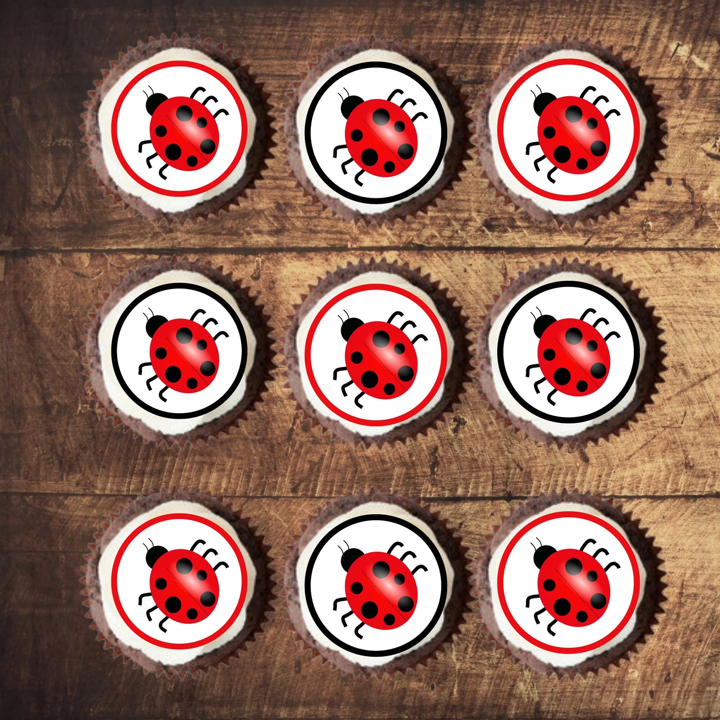 Ladybird Themed Edible Cupcake Toppers on chocolate cupcakes with white frosting