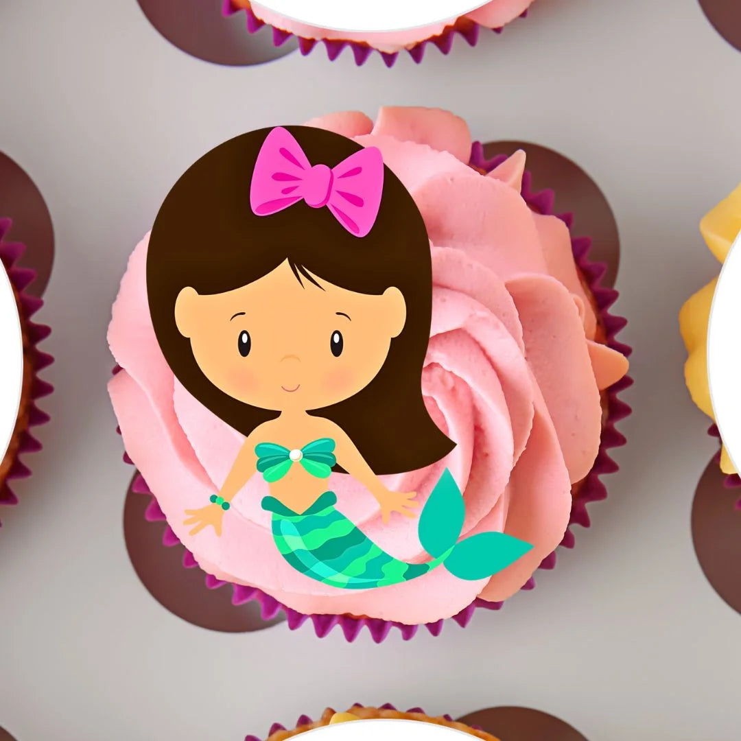 Mermaid Theme Edible Cupcake Toppers on cupcakes with pink frosting