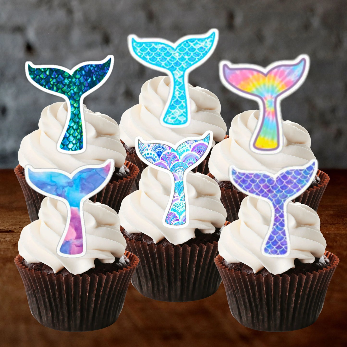 Mermaid Tails Edible Cupcake Toppers on white frosted cupcakes