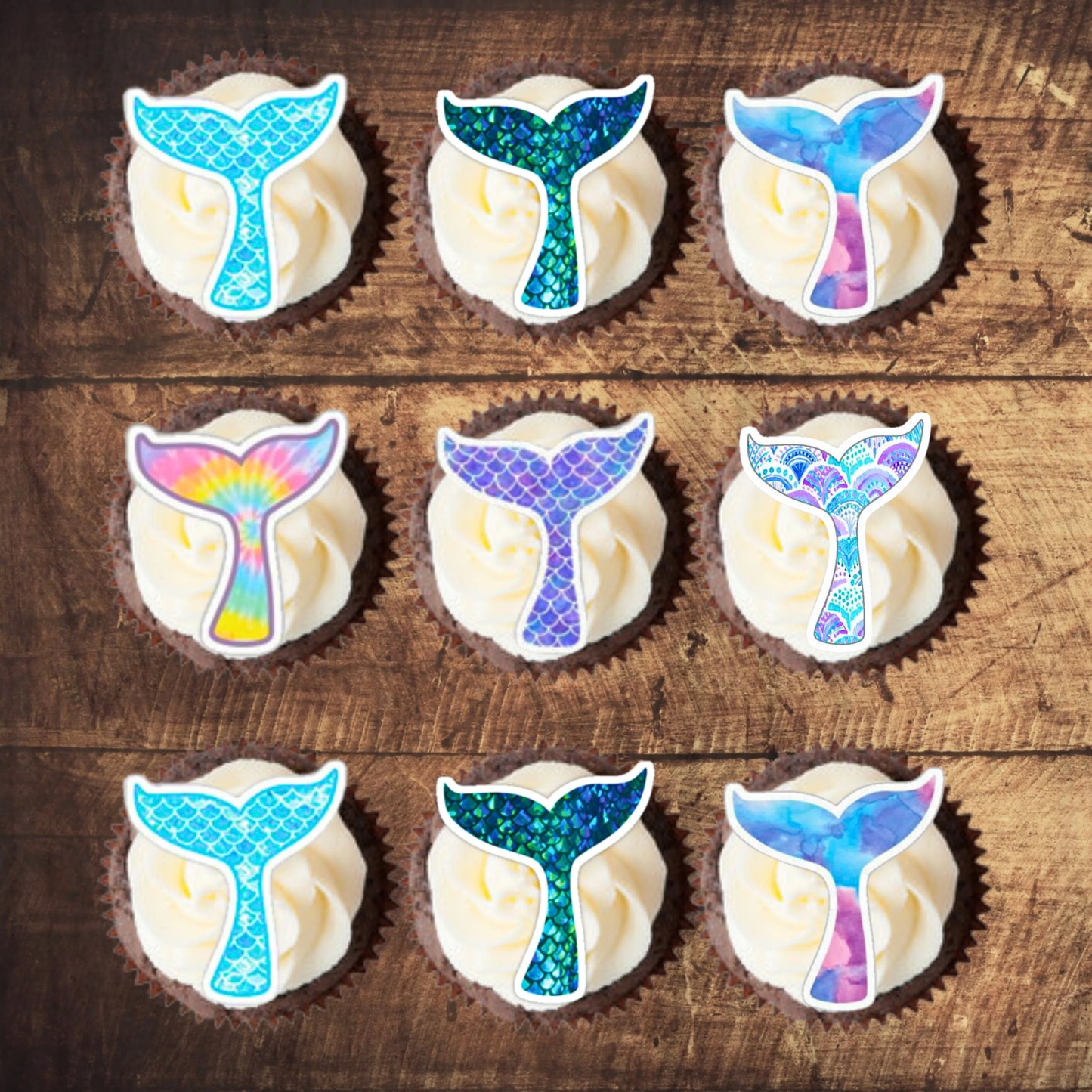 Mermaid Tails Edible Cupcake Toppers on white frosted cupcakes
