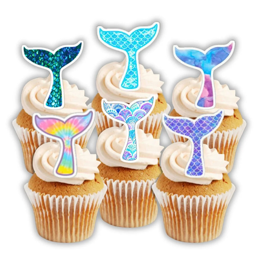 Mermaid Tails Edible Cupcake Toppers on white frosted cupcakes