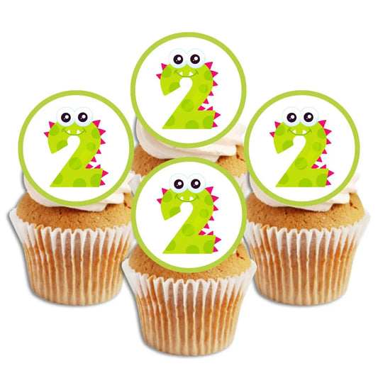 edible cupcake toppers with a green monster themed number 2 on white frosted cupcakes