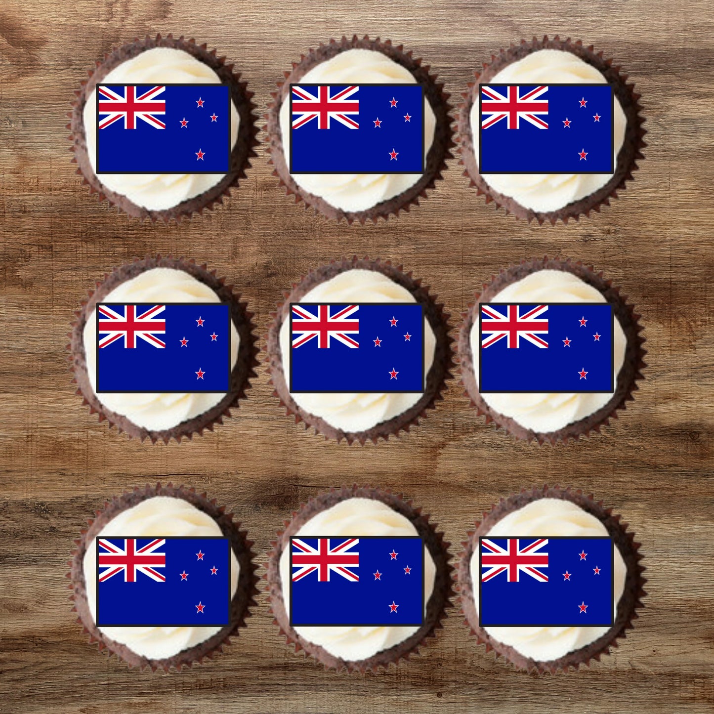 New Zealand Flag Edible Cupcake Toppers on chocolate cupcakes with white frosting