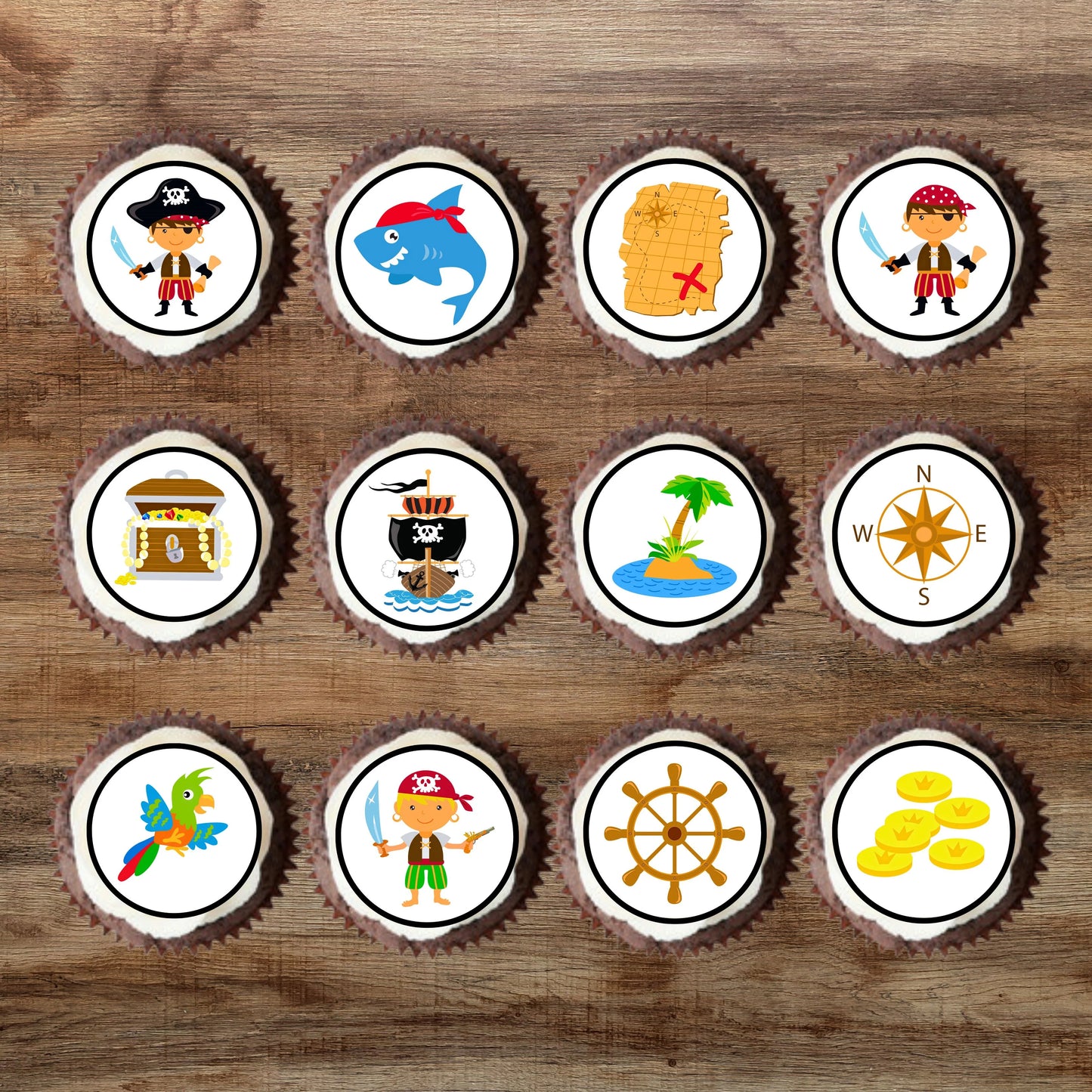 Pirate theme colourful Edible Cupcake Toppers on white frosted cupcakes