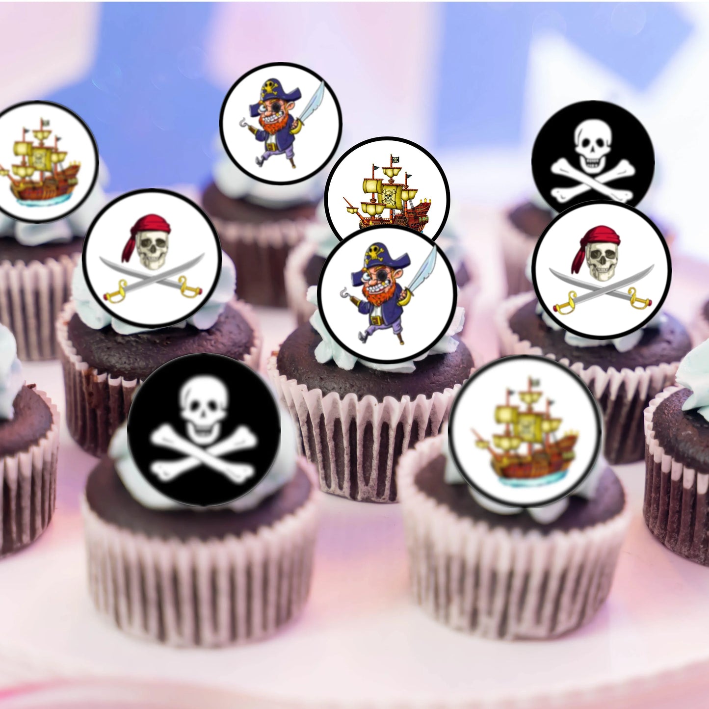 Pirate Theme Edible Cupcake Toppers on chocolate cupcakes with white frosting