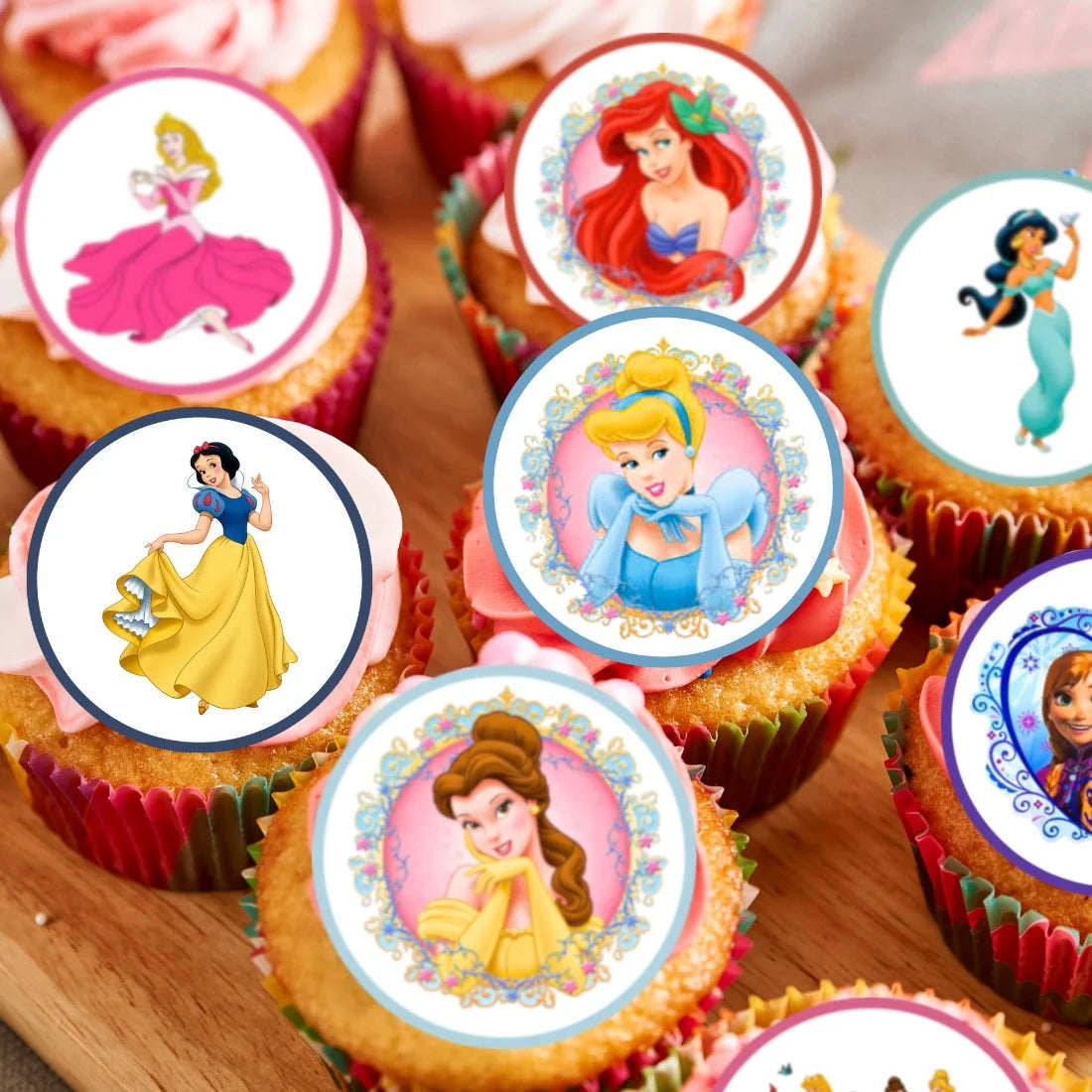Princess Themed Edible Cupcake Toppers on cupcakes with pink frosting