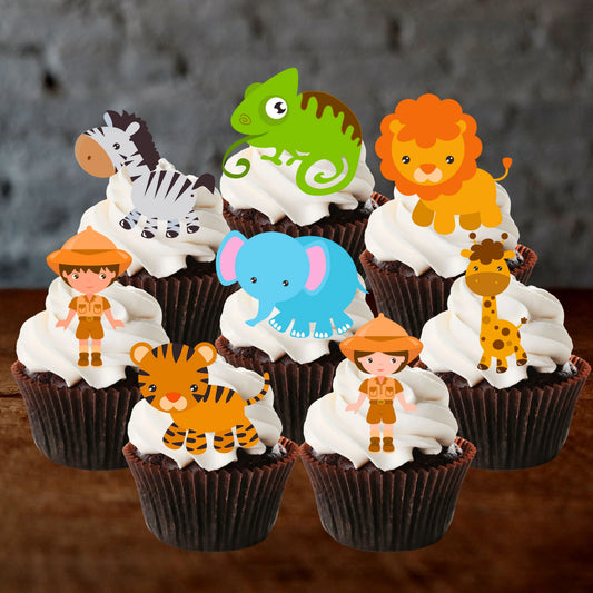 eight chocolate cupcakes with white frosting and cupcake toppers featuring safari animals and characters
