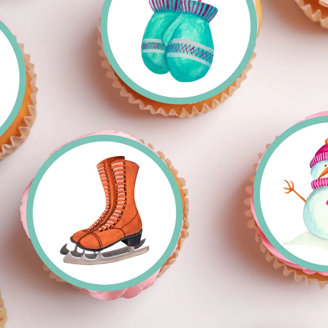 Ski Winter Theme Edible Cupcake Toppers on chocolate cupcakes with white frosting