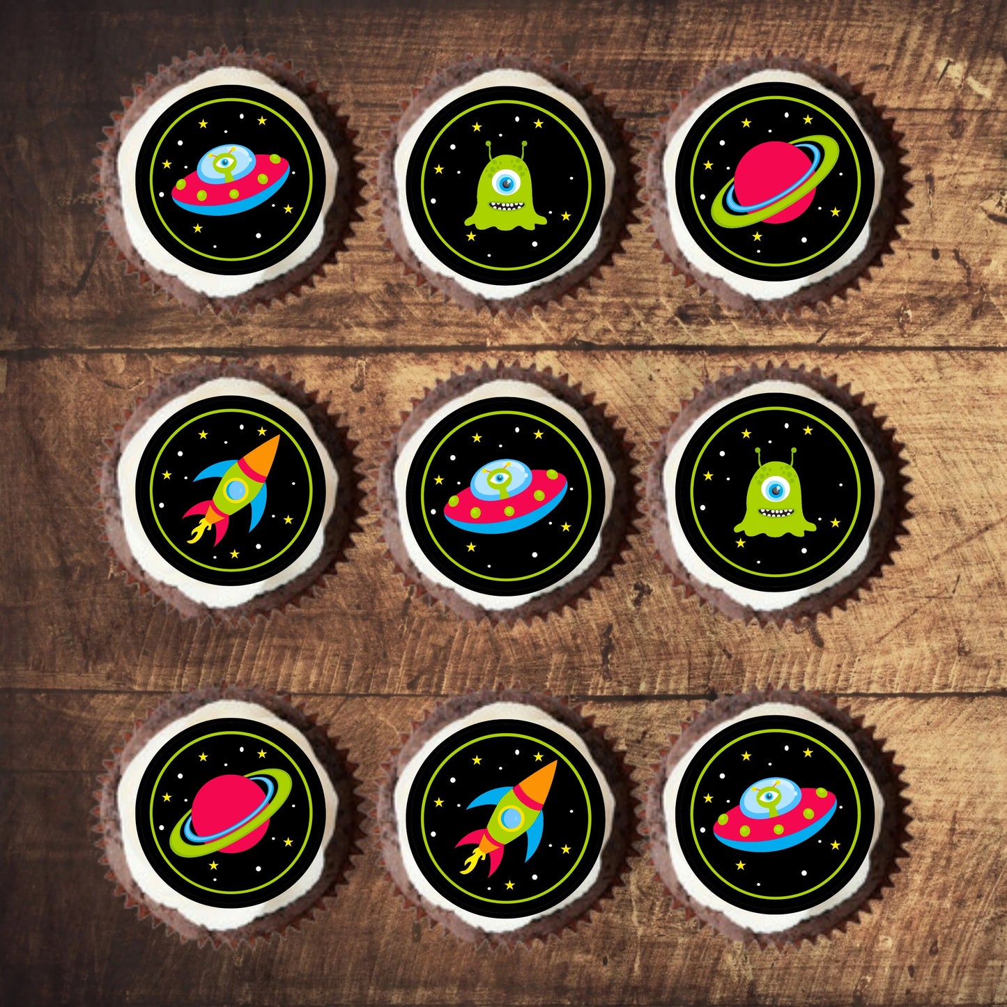 Space Theme Edible Cupcake Toppers on chocolate cupcakes toppers with white frosting