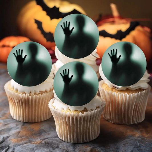 Halloween Spooky Ghost Edible Cupcake Toppers on cupcakes with white frosting