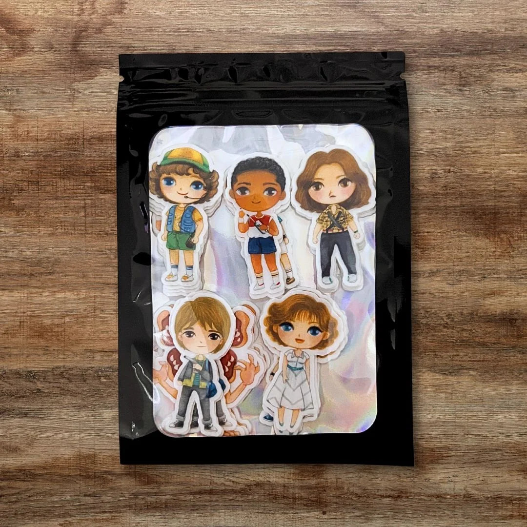 Strange Kids Edible Cupcake Toppers in black packaging