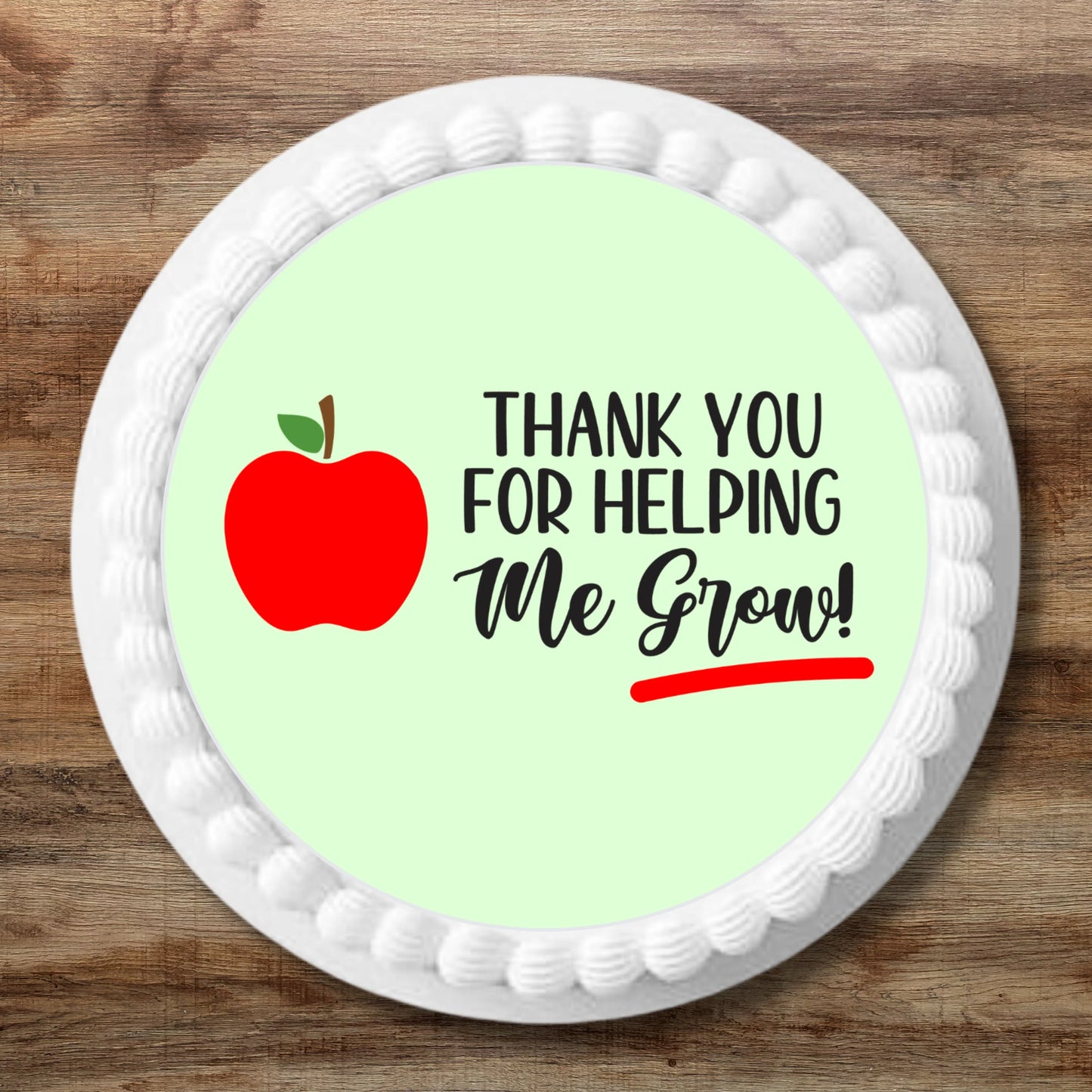 large green Thank You For Helping Me Grow Edible cake Toppers on a white frosted cake