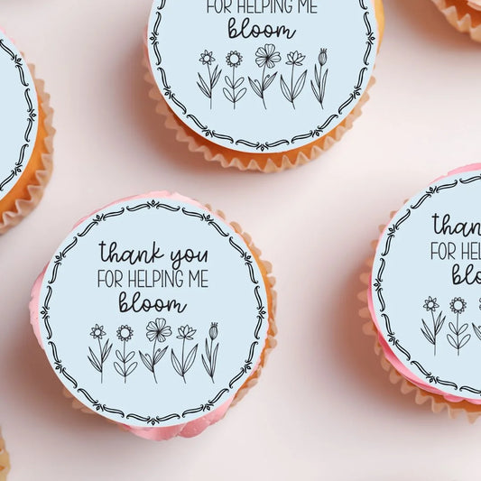 Thank You For Helping Me Bloom Edible Cupcake Toppers on white frosted cupcakes