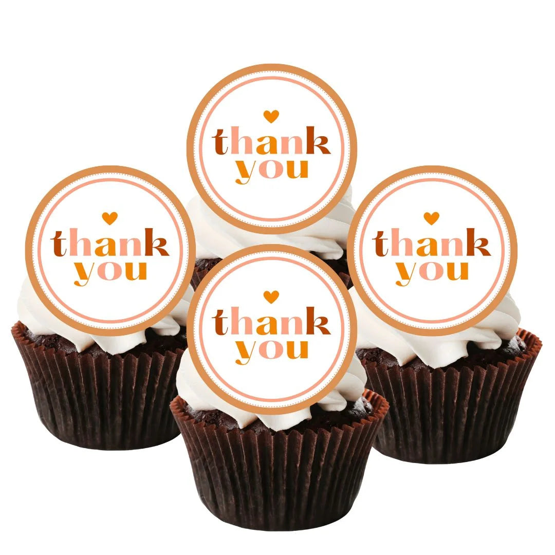 Thank You Gold Cupcake Toppers on chocolate cupcakes with white frosting
